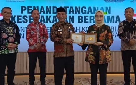 Jangcik Mohza PJ Bupati Merangin Teken MOU Dengan Pemkot Jambi